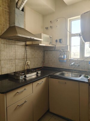 Kitchen in 1 BHK Apartment at Paras Tierea, Sector 137 – for Rent
