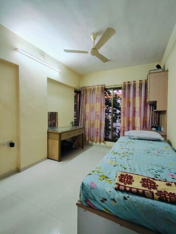 Bedroom in 2 BHK Apartment at Manshanti CHS, Borivali West – for Sale