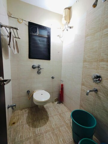 Bathroom in 2 BHK Apartment at Manshanti CHS, Borivali West – for Sale