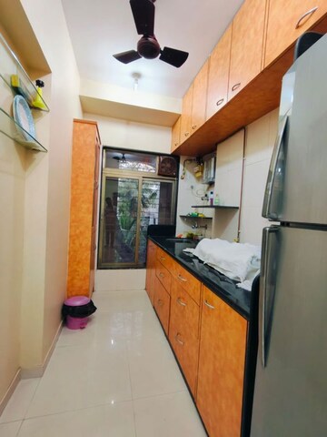 Kitchen in 2 BHK Apartment at Manshanti CHS, Borivali West – for Sale