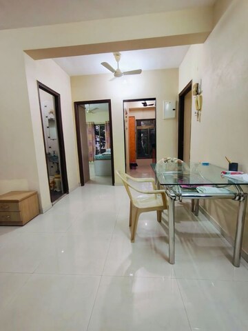 Living Room in 2 BHK Apartment at Manshanti CHS, Borivali West – for Sale