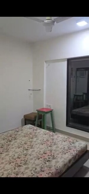 Bedroom in 2 BHK Apartment at Goregaon West View CHS, Goregaon West – for Rent
