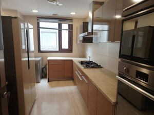 Kitchen in 4 BHK Apartment at Vasant Vihar – for Rent
