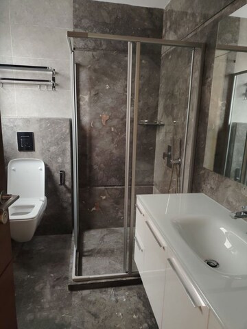 Bathroom in 4 BHK Apartment at Vasant Vihar – for Rent