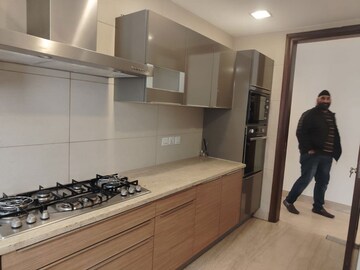 Kitchen in 4 BHK Apartment at Vasant Vihar – for Rent