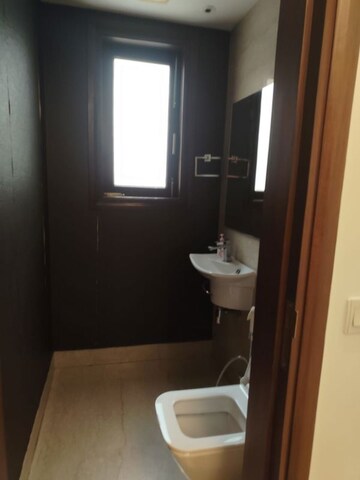 Bathroom in 4 BHK Apartment at Vasant Vihar – for Rent