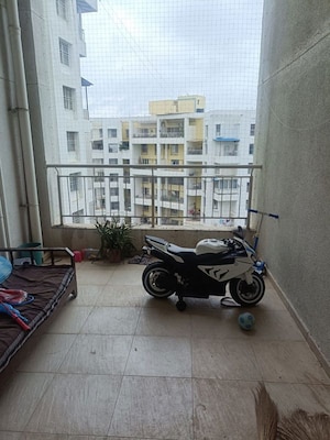 Balcony in 2 BHK Apartment at Bhugaon – for Sale