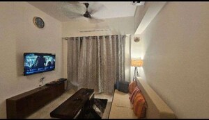 Living Room in 1 BHK Apartment at Lodha Amara, Kolshet Road – for Rent