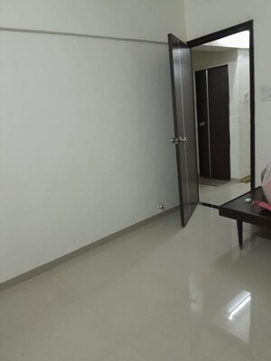 Room in 2 BHK Apartment at Tulsi Building, Borivali East – for Rent