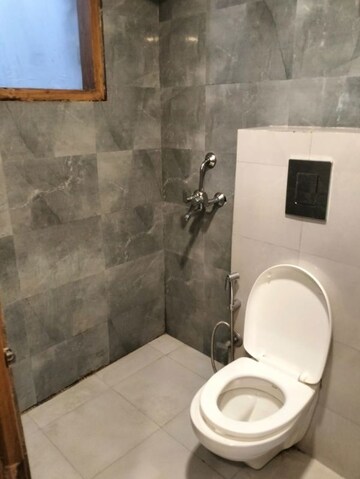 Bathroom in 1 BHK Builder Floor at Signature Tower Sector 30, Sector 30 – for Rent