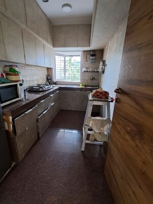 Kitchen in 3 BHK Apartment at Sarkar Avenue Apartment, Santacruz West – for Rent