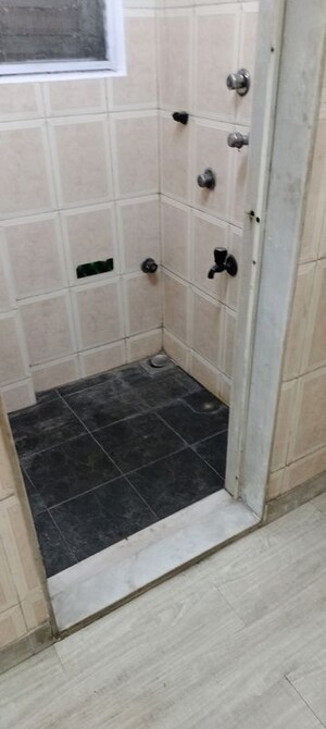 Bathroom in 1 BHK Apartment at Swiss Palace, Andheri West – for Rent