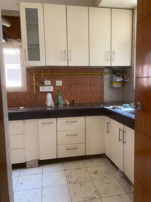 Kitchen in 3 BHK Apartment at Orchid Petals, Sector 49 – for Sale