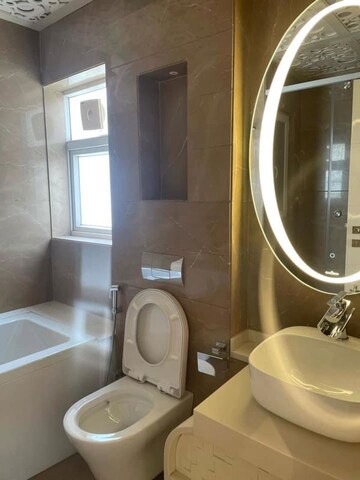 Bathroom in 4 BHK Apartment at Orchid Petals, Sector 49 – for Sale