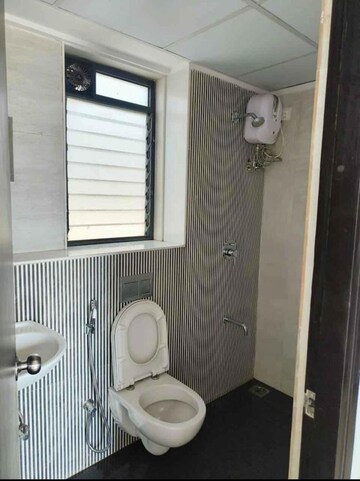 Bathroom in 2 BHK Apartment at Eversmile Jasmine Towers, Vasant Vihar – for Rent