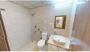 Bathroom in 2 BHK Apartment at Bhartiya City Nikoo Homes 4, Thanisandra Main Road – for Sale