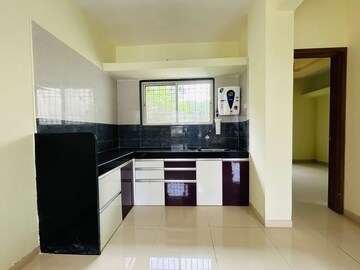 Kitchen in 2 BHK Apartment at Gokhale Harmony Apartments, Anand Nagar – for Sale