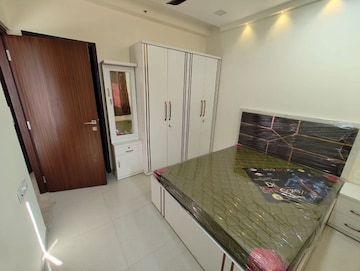 Bedroom in 2 BHK Apartment at Omkar Signet, Malad East – for Rent