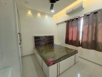 Master Bedroom in 2 BHK Apartment at Omkar Signet, Malad East – for Rent