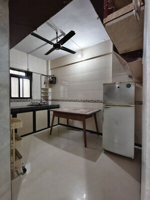 Kitchen in 1.5 BHK Apartment at Suyash Shopping Centre, Goregaon East – for Rent