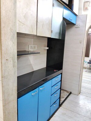 Kitchen in 2 BHK Apartment at Kamal Apartments Kandivali, Kandivali West – for Rent