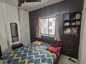 Bedroom in 2 BHK Apartment at KrishnaLeela Laxmi Ganga Heights, Vadgaon Budruk – for Rent