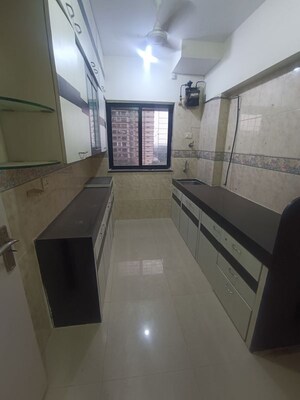 Kitchen in 3 BHK Apartment at K Rahega Palm Springs, Malad West – for Rent