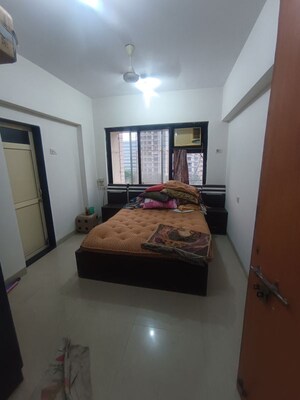 Bedroom in 3 BHK Apartment at K Rahega Palm Springs, Malad West – for Rent