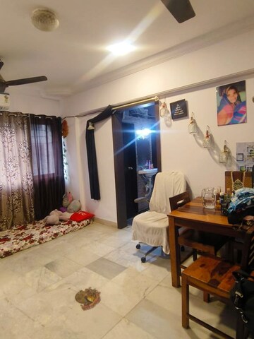 Living Room in 1 BHK Apartment at Atlanta CHS, Malad West – for Rent