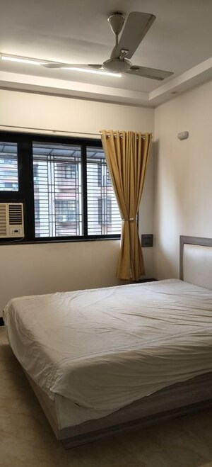 Room in 2 BHK Apartment at Indradarshan II, Oshiwara – for Rent