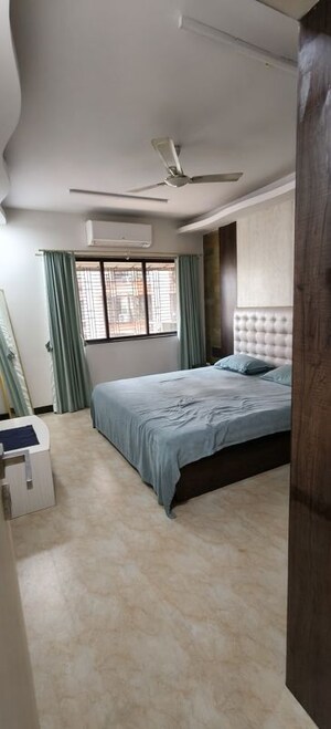 Bedroom in 2 BHK Apartment at Indradarshan II, Oshiwara – for Rent