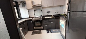 Kitchen in 2 BHK Apartment at Indradarshan II, Oshiwara – for Rent