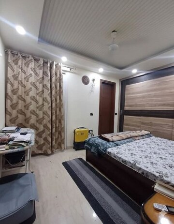 Bedroom in 2 BHK Builder Floor at Kalkaji – for Rent