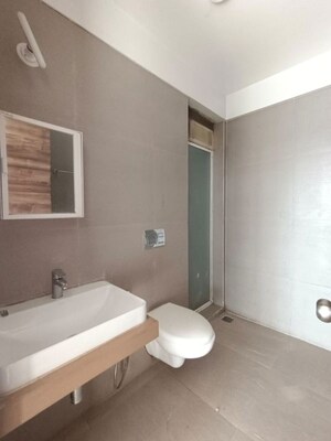 Bathroom in 2 BHK Apartment at Akshar Alvario, Seawoods – for Rent