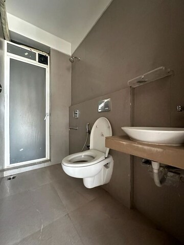 Bathroom in 2 BHK Apartment at Akshar Alvario, Seawoods – for Rent