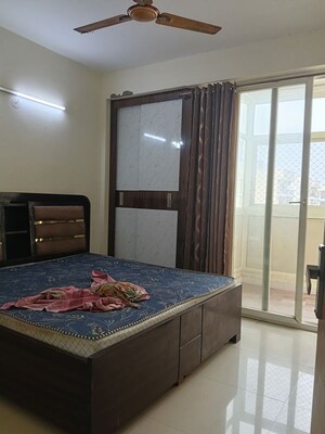 Bedroom in 2 BHK Apartment at JKG Palm Resort, Raj Nagar Extension – for Rent