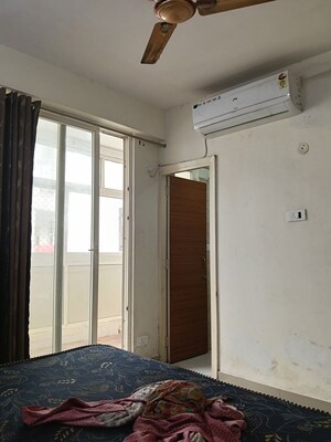 Room in 2 BHK Apartment at JKG Palm Resort, Raj Nagar Extension – for Rent