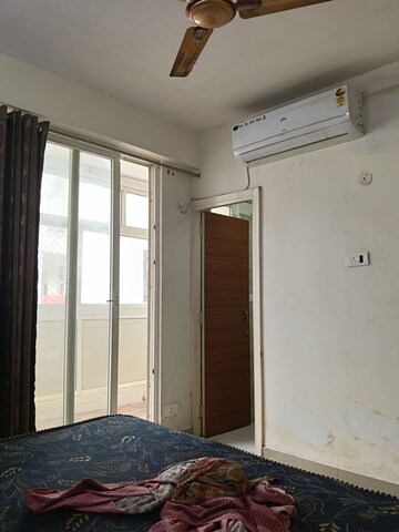 Room in 2 BHK Apartment at JKG Palm Resort, Raj Nagar Extension – for Rent