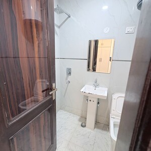 Bathroom in 2 BHK Builder Floor at Khirki Extension – for Sale