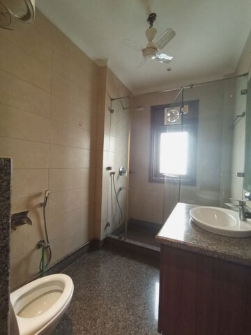 Bathroom in 3.5 BHK Apartment at Pamposh Enclave – for Rent