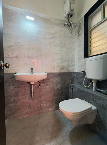 Bathroom in 2 BHK Apartment at Ayaan Society , Wagholi – for Rent