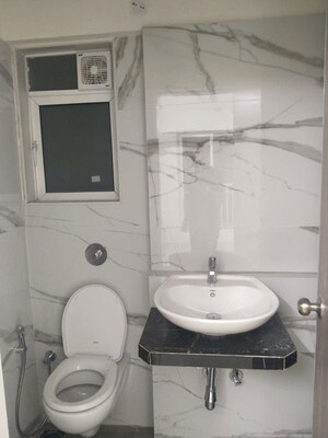 Bathroom in 1 BHK Apartment at Hirani Om Sukhkarta Heights, Vikhroli East – for Rent