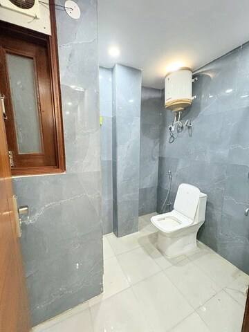 Bathroom in 2 BHK Builder Floor at Chattarpur – for Rent