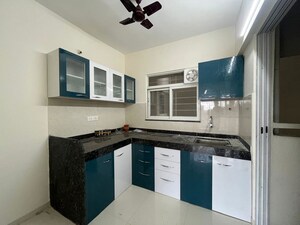 Kitchen in 3 BHK Apartment at Mantra Insignia, Mundhwa – for Rent