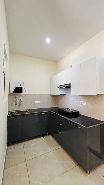 Kitchen in 2 BHK Builder Floor at Hark Sai Homes, Sector 49 – for Sale
