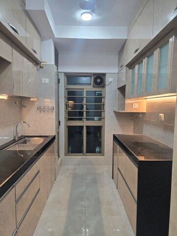 Kitchen in 2 BHK Apartment at Sheth Vasant Oasis, Andheri East – for Rent