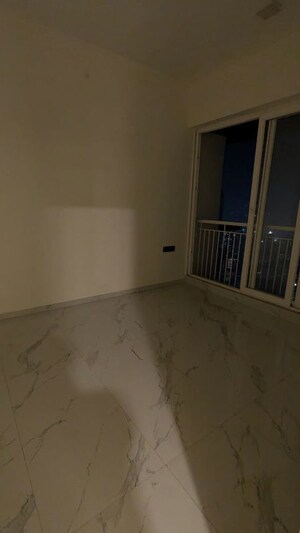 Room in 2 BHK Apartment at Ruparel Sky Green, Kandivali West – for Sale