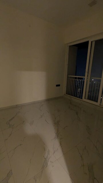 Room in 2 BHK Apartment at Ruparel Sky Green, Kandivali West – for Sale