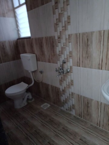 Bathroom in 1 BHK Apartment at Kanchan Onyx, Pisoli – for Rent