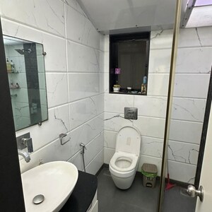 Bathroom in 1 BHK Apartment at Abhishek Premises, Veera Desai Industrial Estate – for Rent